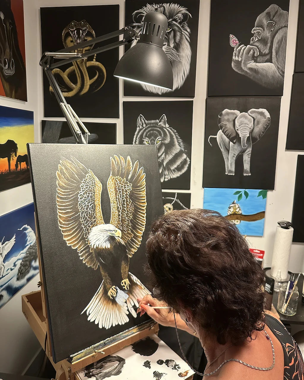 Sonia painting in studio